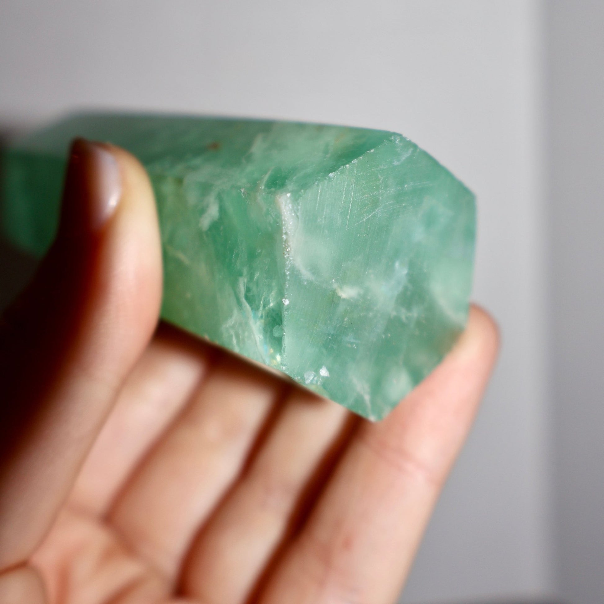 shiny Fluorite Obelisk, Icey Seafoam Green Crystal 3-4" in lighting effect