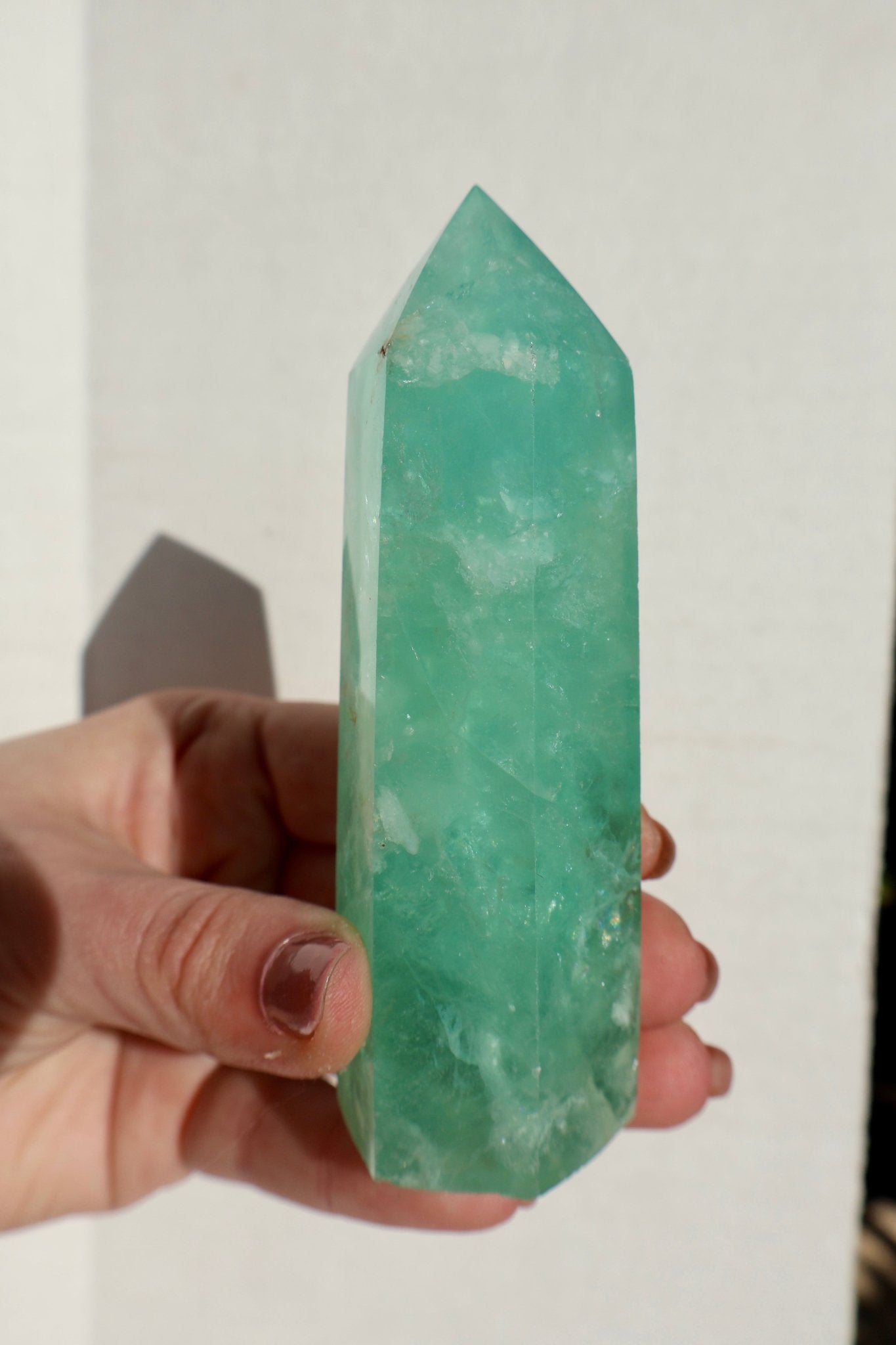 textured Fluorite Obelisk, Icey Seafoam Green Crystal 3-4" in close-up shot