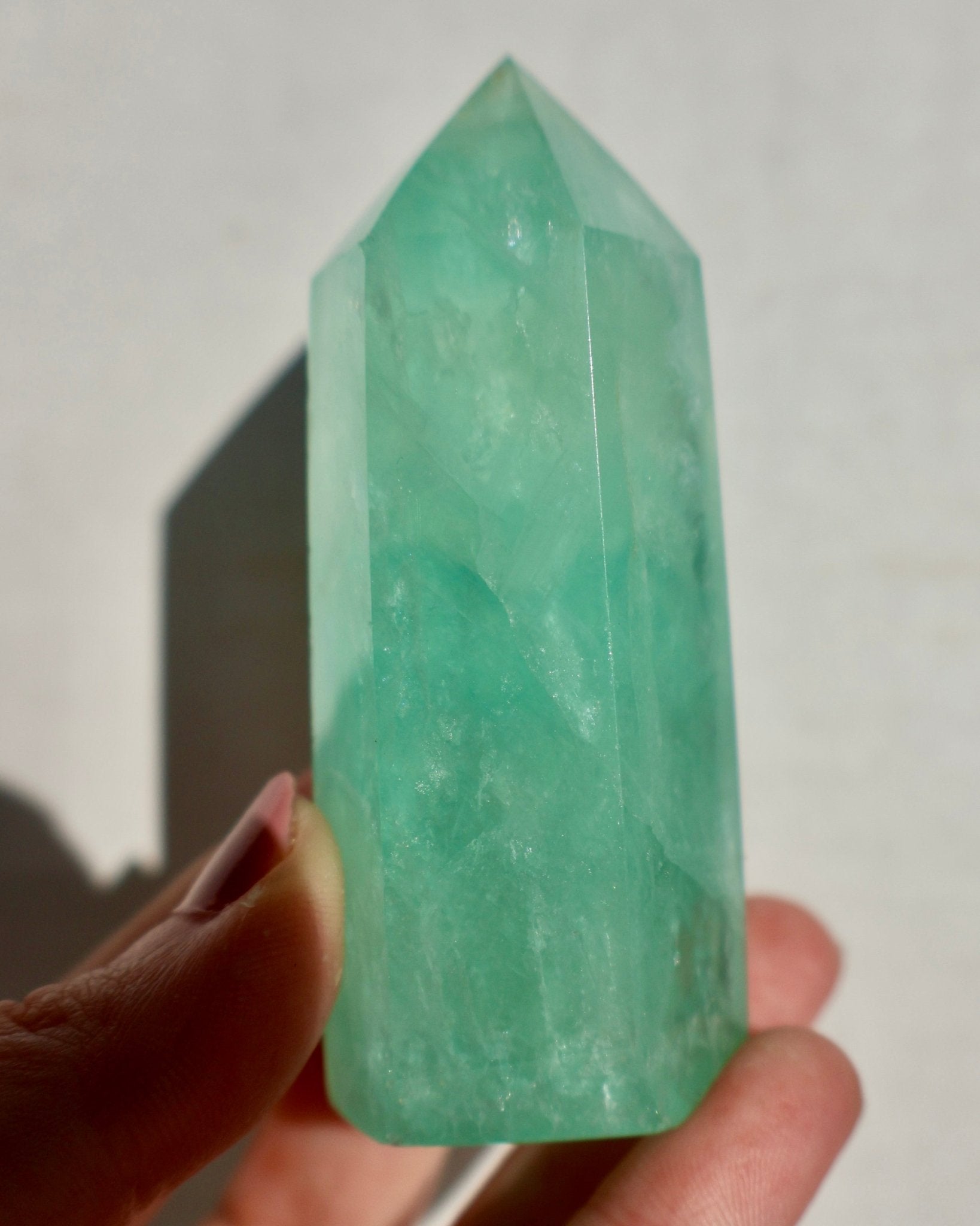 textured Fluorite Obelisk, Icey Seafoam Green Crystal 3-4" in lighting effect